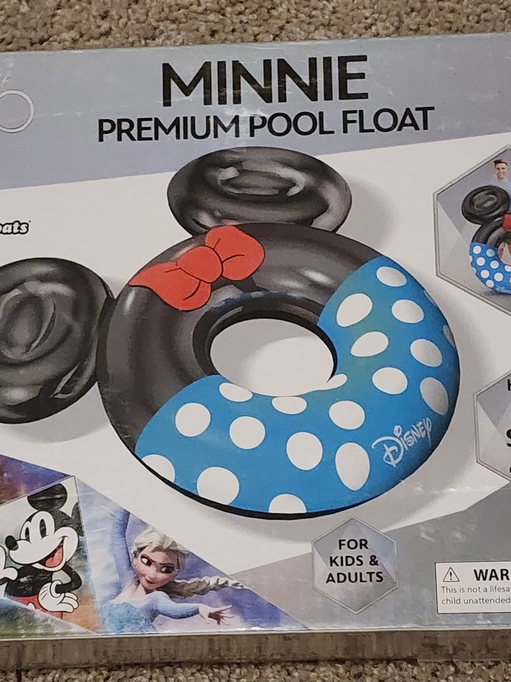 Disney Minnie Mouse Black Float with Blue Polka Dot Skirt and Red Bow